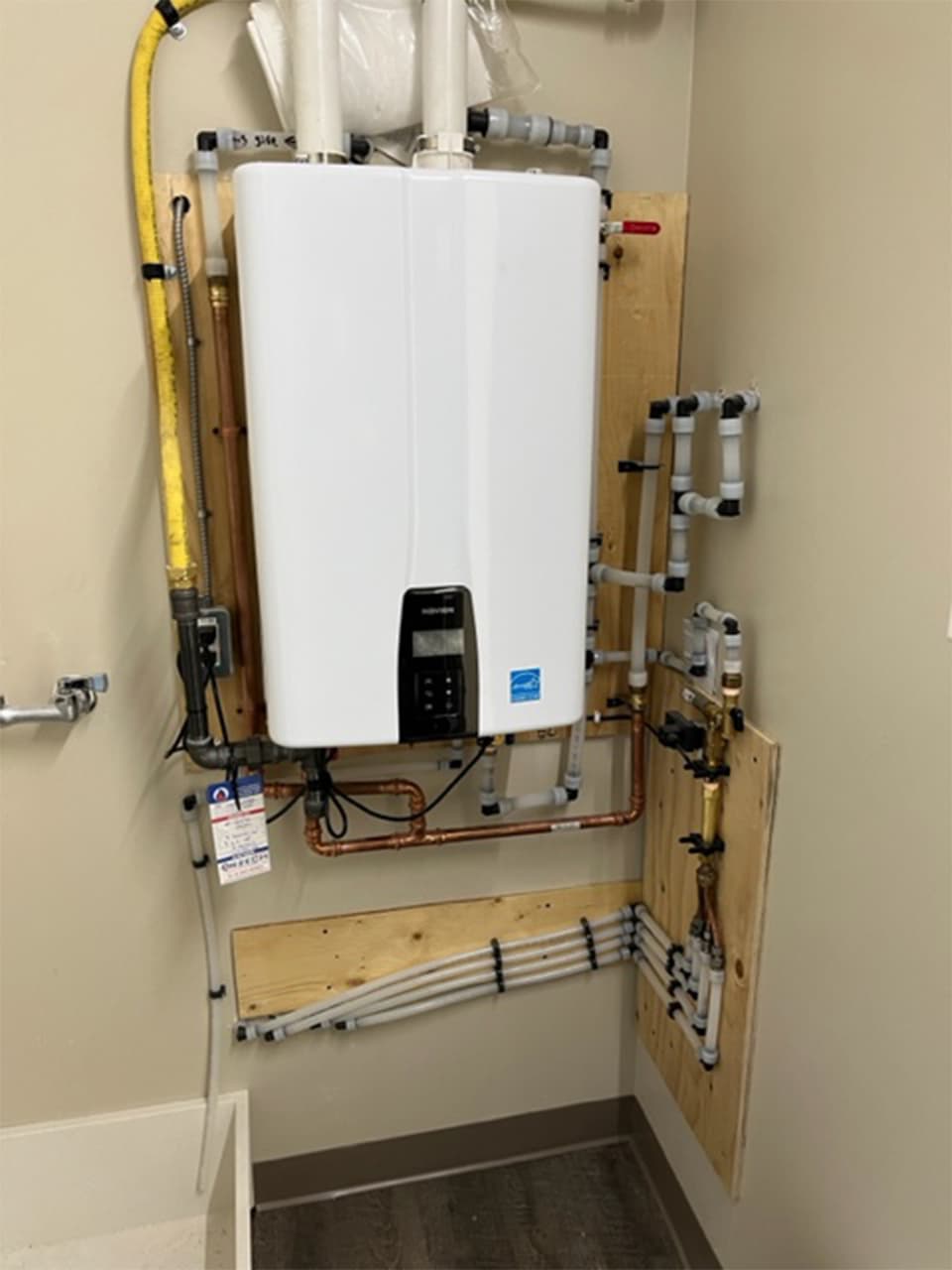 Picture of Tankless on demand hot water heater.